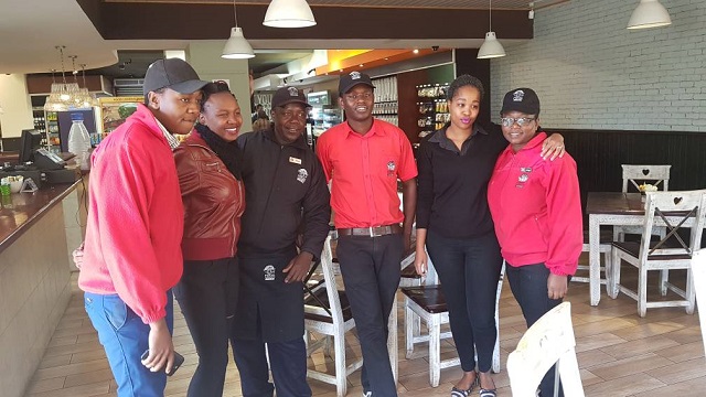 Trinity Sibanda (second left), Zodwa Wabantu’s Byo ‘twin’ with Food Lover’s Market staff