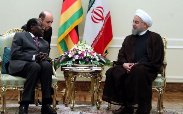 Zimbabwean President Robert Mugabe and Iranian President Hassan Rouhani