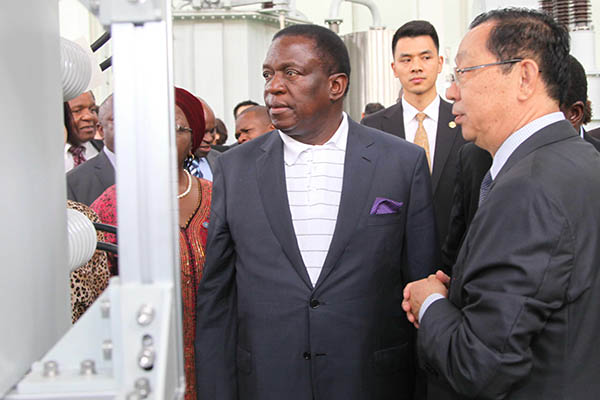 HOME >> NEWS >> INTERNATIONAL EXCHANGES Chinese firms plan special economic zone in Zimbabwe Li Lianxing and Xie Chuanjiao Updated: Jul 11,2015 10:26 AM China Daily Emmerson Mnangagwa, vice-president of Zimbabwe, visits Qingdao Hengshun Zhongsheng Group Co Ltd in Qingdao, Shandong province on July 9. Hengshun Zhongsheng is to work with other two companies to jointly build a special industrial park with an area of 100 square kilometers in Zimbabwe.[Photo/China Daily]