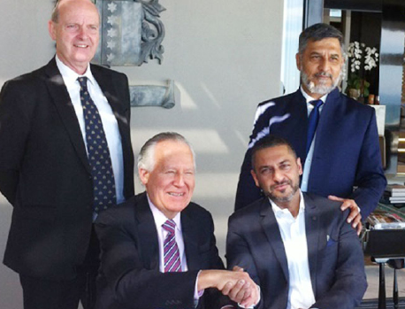 Joining hands to work together are Lord Peter Hain (front left), Zunaid Moti (front right), Paul O’Sullivan (back left) and Ashruf Kaka (CE of the Moti Group). (Pic: Carin Smith)