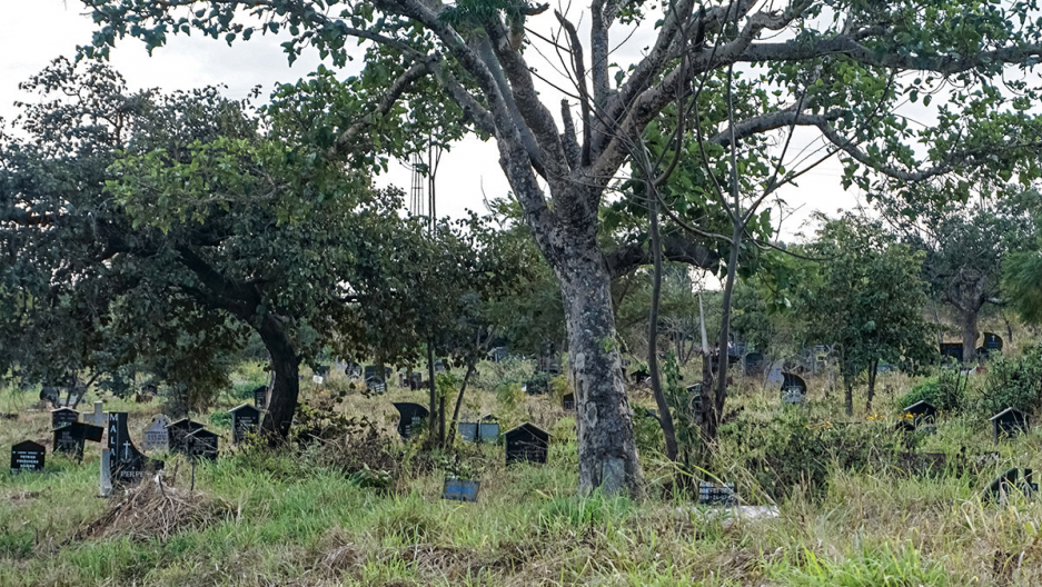 Many Zimbabweans choose funeral insurance over medical insurance, to guarantee that they’ll be able to afford gravestones, funeral services and other details that are expected here. Pictured is a cemetery in Mutare, Zimbabwe. Credit: Evidence Chenjerai/GPJ Zimbabwe