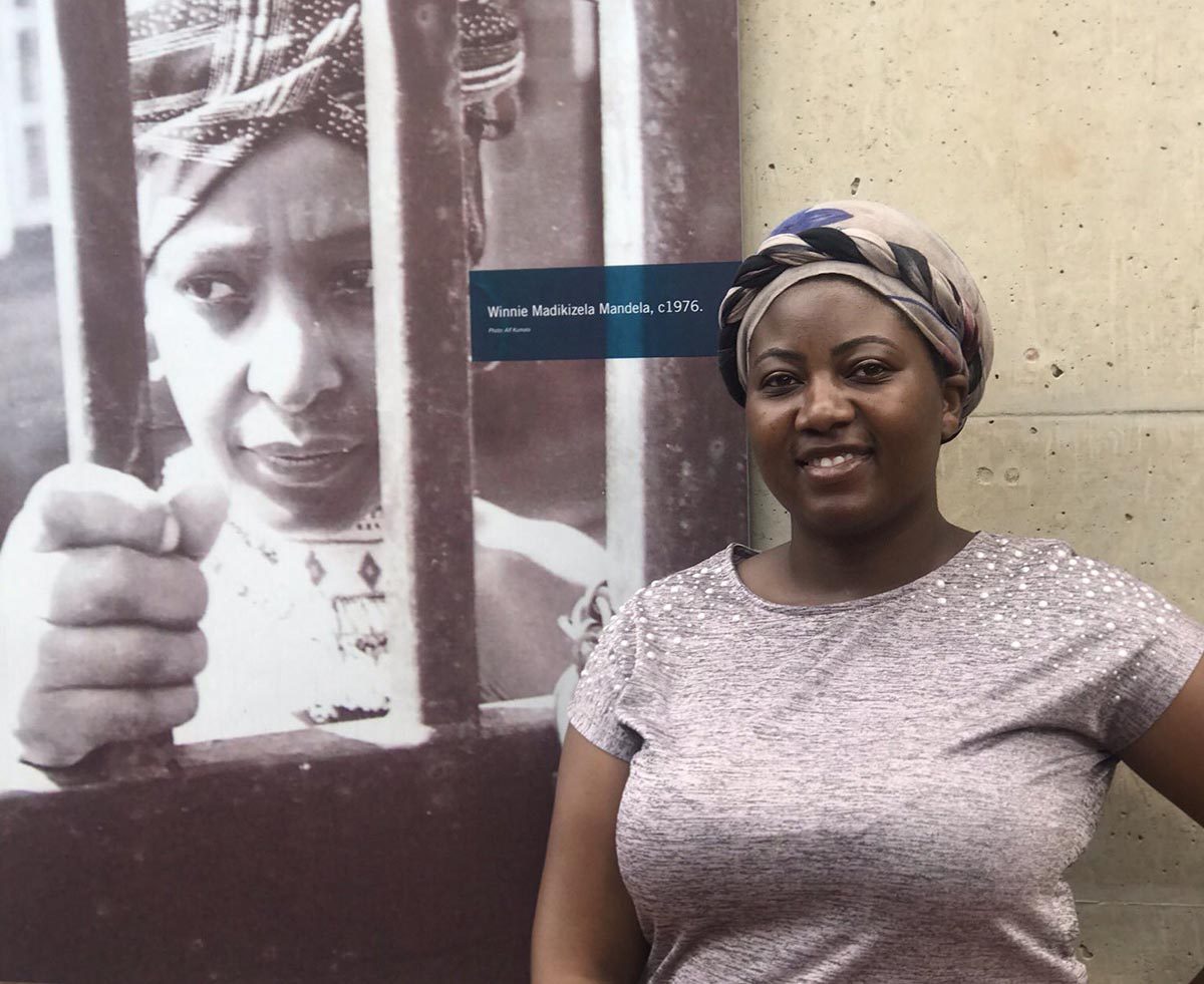 Freedom ... Harare West MP Joana Mamombe posing next to a picture of South African apartheid icon Winnie Madikizela Mandela in prison